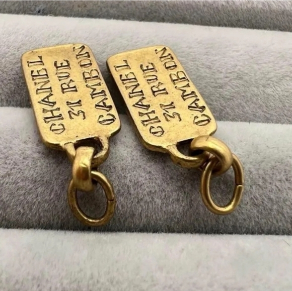 CHANEL Jewelry - Chanel Vintage Gold Earring Tag Charms includes a COA